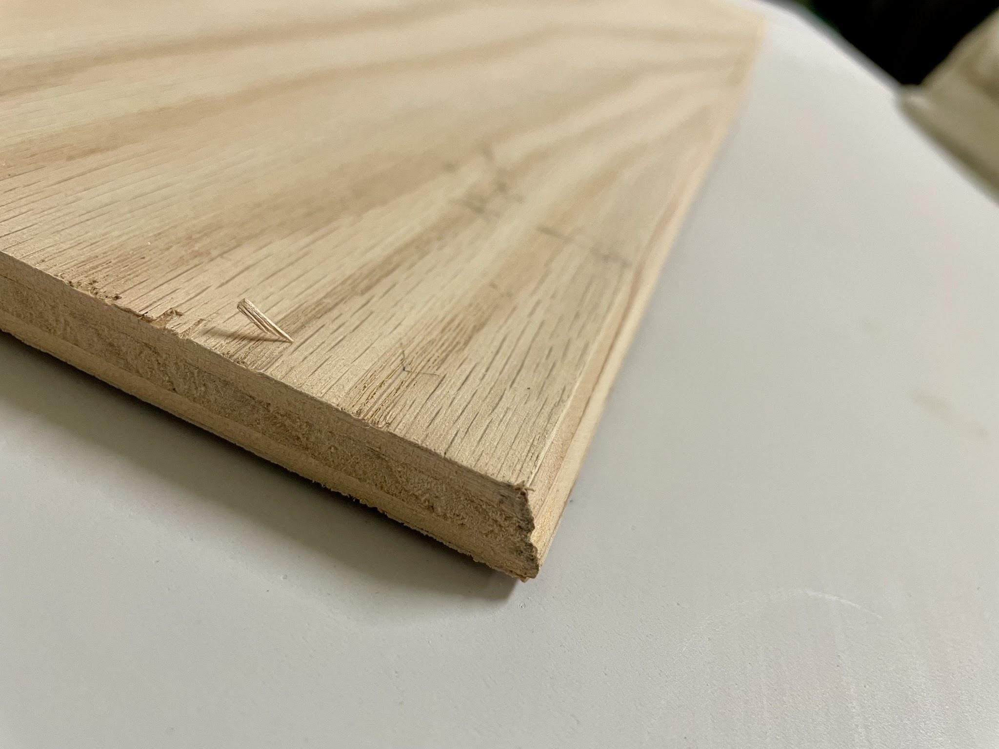Angled forward edge sanded into the console base