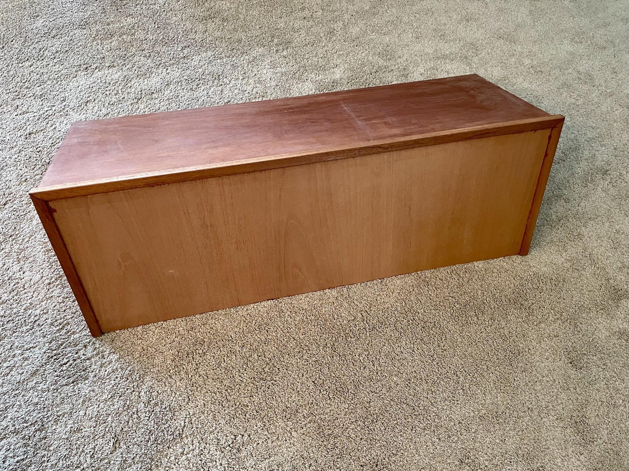 Removable front panel sitting in place on the console cabinet